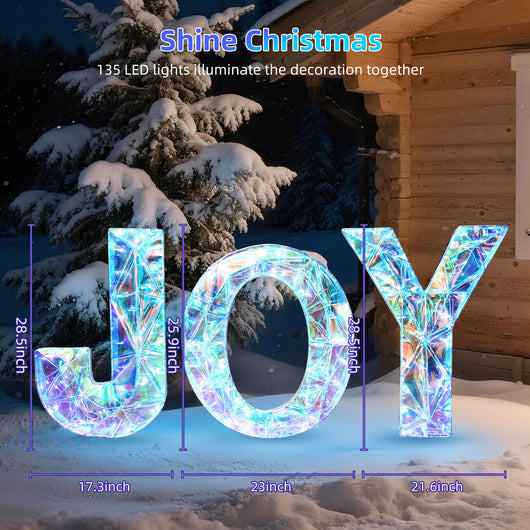 Daytime view of HOYECHI JOY Christmas yard decoration with iridescent prismatic sequin letters