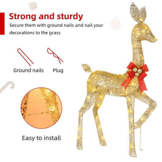 Outdoor Christmas lawn decorated with HOYECHI LED reindeer family lights at night