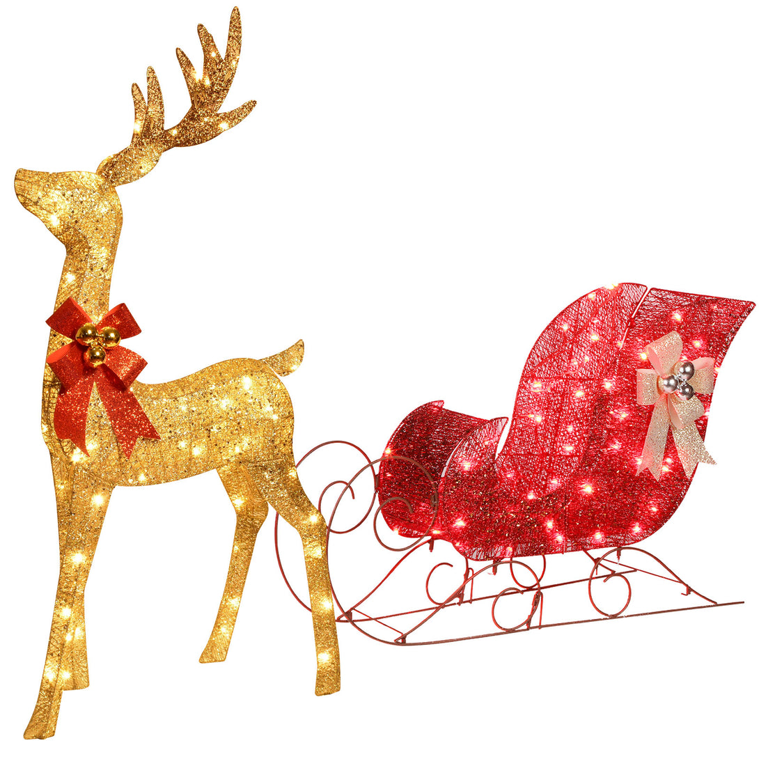 HOYECHI illuminated gold reindeer and red sleigh with decorative bows on a white background