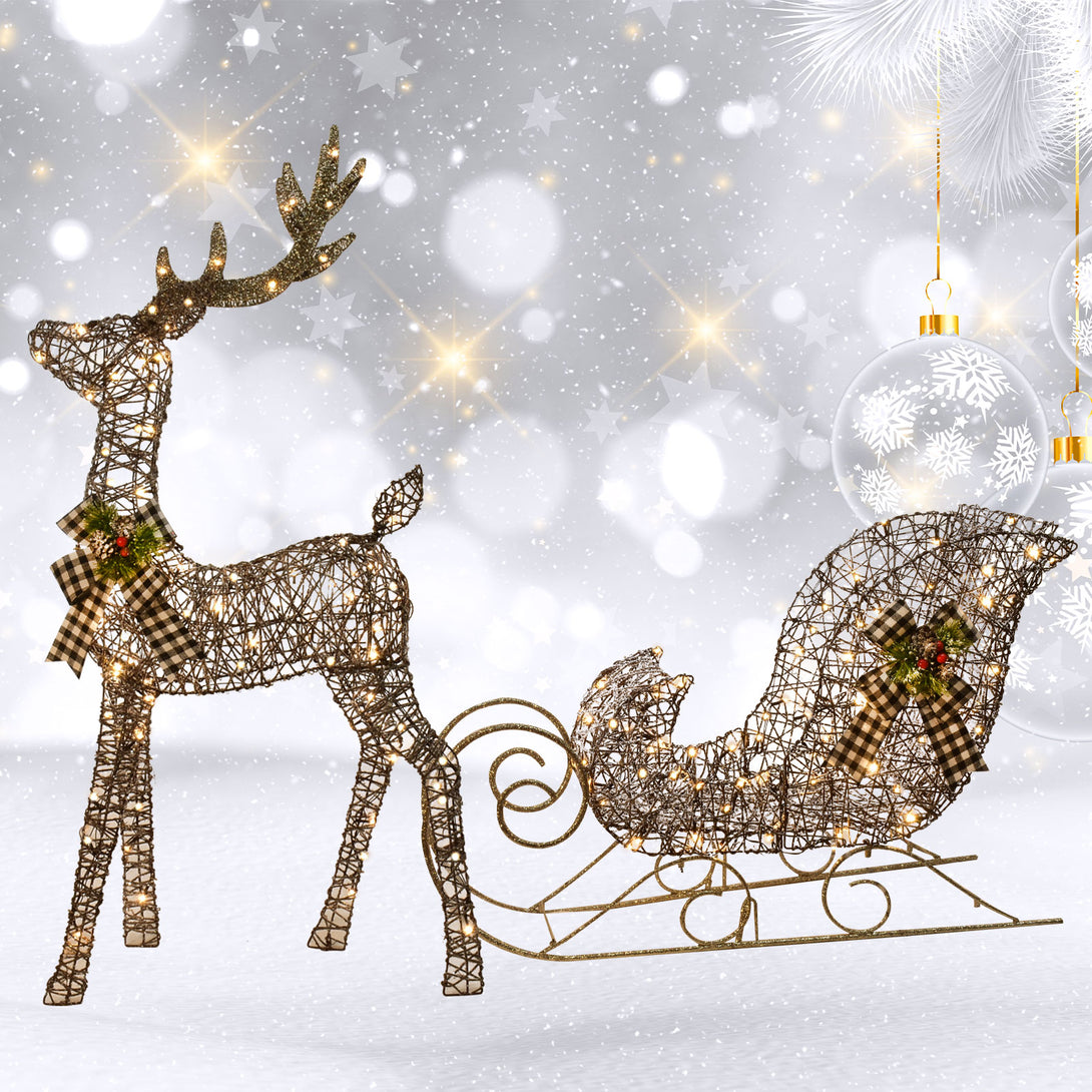 Rattan-style reindeer and sleigh displayed as one holiday scene