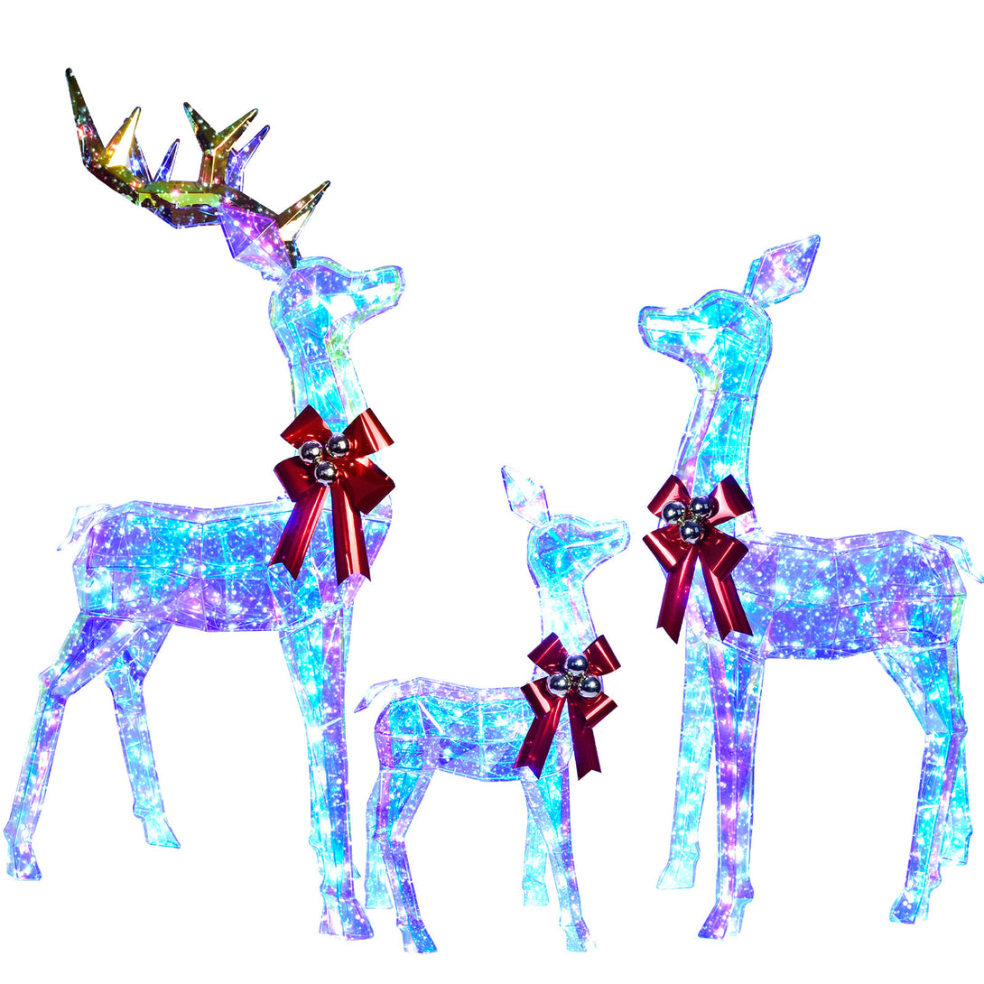 Three prismatic reindeer facing different directions on a white background