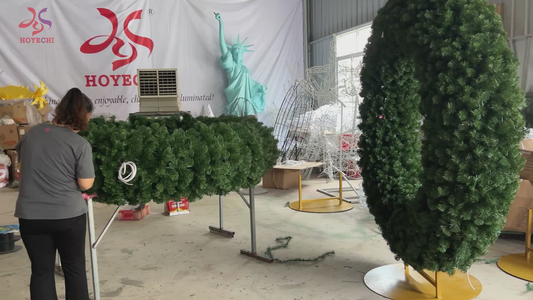 Indoor display of HOYECHI large eco-friendly PVC Christmas wreath used as decorative holiday garland