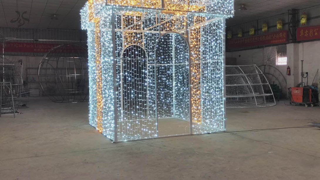 Video thumbnail of HOYECHI walk-through LED gift box arch showing lighted doorway effect for Christmas home entryways